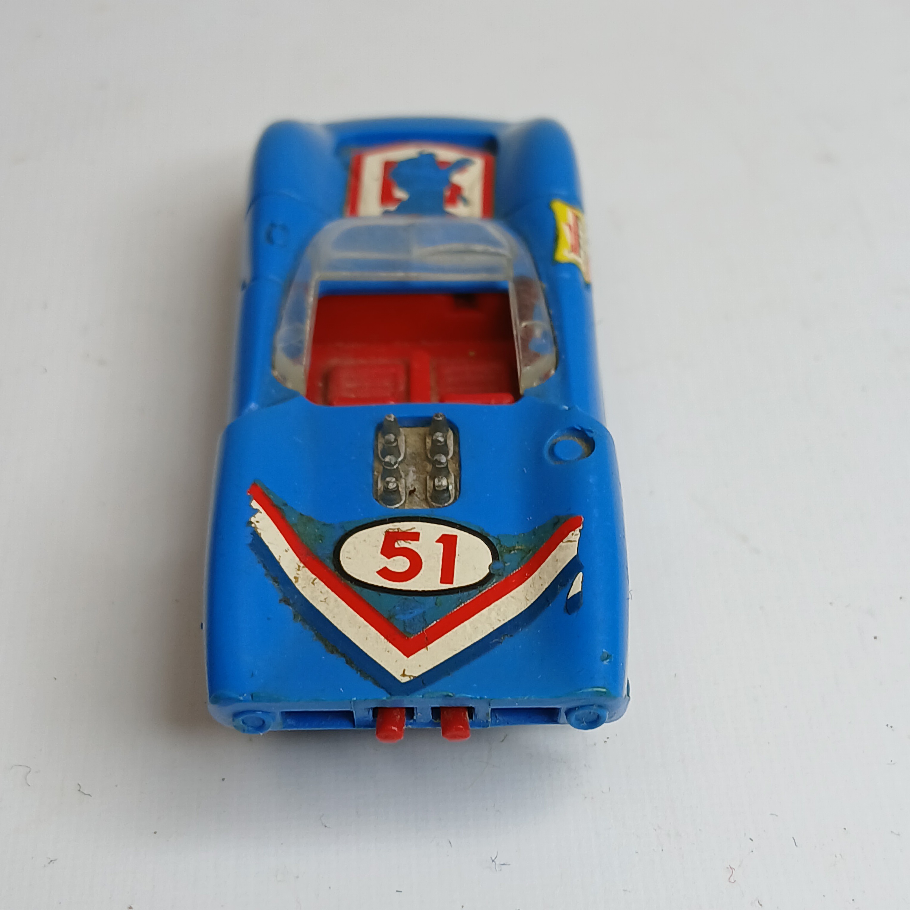 Voir photo 4 de Miniature CHAMPION - Lola T-70 (années 1960/70).Made in France - Echelle 1/64ème. Miniature CHAMPION - Lola T-70 (années 1960/70).Made in France - Echelle 1/64ème. État correct - Vue 4 -